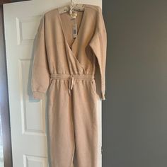 L Space Coastin’ Long Sleeve Jumpsuit. Taupe. V Neck. Tie Waist. Cuffed Hems And Sleeves. Thick Ribbed Fabric. 100% Cotton. Size Small. Brand New With Tags. All Sales Are Final. Relaxed Fit Long Sleeve Jumpsuits And Rompers For Lounging, Relaxed Fit Long Sleeve Jumpsuit For Lounging, Relaxed Fit Long Sleeve Jumpsuits For Loungewear, Beige Jumpsuits And Rompers For Fall Loungewear, Spring Long Sleeve Jumpsuits And Rompers For Lounging, Casual Beige Long Sleeve Jumpsuits And Rompers, Beige Long Sleeve Casual Jumpsuit, Beige Overall Jumpsuit For Fall, Casual Cream Jumpsuits And Rompers For Loungewear