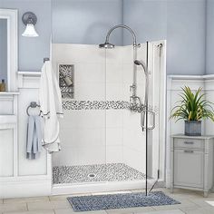 a bath room with a stand up shower