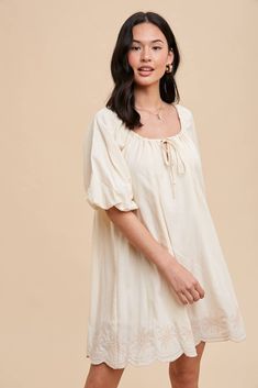 Introducing the Sasha Embroidered Puff Sleeve Dress! The dress is flowy, has a loose fit, and was crafted from a luxurious cotton modal blend. With statement puffed bubble sleeves, a romantic gathered neckline with self-tie ribbon, and a beautifully scalloped edged hem with floral embroidery, this dress is a Summer staple. Fully lined for added comfort. Content - Modal Cotton: 97%/ Polyester 3%  Brand: In Loom Spring Cotton Puff Sleeve Dress With Lantern Sleeves, Cotton Puff Sleeve Dress For Brunch, Cotton Peasant Dress With Gathered Sleeves, Cotton Puff Sleeve Dress With Bishop Sleeves, Billowy Puff Sleeve Peasant Dress, Flowy Peasant Dress With Puff Sleeves, Tie Ribbon, Fiber Art Quilts, Gathered Neckline