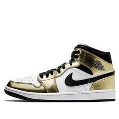 The Air Jordan 1 Mid SE ‘Metallic Gold’ is the perfect sneaker to add some luxury to your style. The white leather upper is contrasted by metallic gold overlays and black hits on the Swoosh and collar, creating a look that will turn heads. With Jumpman iconography woven into the tongue tag and classic Wings logo stamped on the lateral collar flap, this mid-top sneaker has all of the details covered. And don’t forget about the encapsulated Nike Air cushioning in the heel – it ensures a comfortable, luxurious ride. (AJ1/SNKR/Retro/Men's/High Top/Basketball) Sporty Custom Gold Leather Sneakers, Sporty Gold Leather Custom Sneakers, Sporty Gold Sneakers For Streetwear, Leather High-top Sneakers With Metallic Logo, Gold High-top Sneakers With Abzorb Midsole For Streetwear, Gold Sneakers With Contrast Sole For Streetwear, Gold Sneakers With Midsole For Streetwear, Gold Leather Sporty Sneakers, Luxury High-top Sneakers With Boost Midsole For Sports