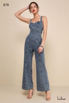 Everyone will wanna copy your perfect style in a look like the Lulus Trendsetting Personality Medium Wash Denim Backless Jumpsuit! Sturdy, woven cotton denim shapes this iconic jumpsuit that has wide straps and a seamed bodice with a sweetheart neckline. Slender straps tie across the stunning open back, creating an ultra-summery effect. Figure-flaunting waist tops wide legs with paneled seaming that finish at ankle-length hems. Hidden zipper/clasp at back. Fit: This garment fits true to size. Le Chic Medium Wash Non-stretch Denim Jumpsuit, Chic Non-stretch Medium Wash Denim Jumpsuit, Chic Medium Wash Cotton Denim Jumpsuit, Chic Light Wash Cotton Jumpsuits And Rompers, Chic Blue Cotton Denim Jumpsuit, Chic Non-stretch Cotton Denim Jumpsuit, Chic Medium Wash Denim Jumpsuit For Summer, Chic Dark Wash Denim Overall Jumpsuit, Chic Summer Medium Wash Denim Jumpsuit