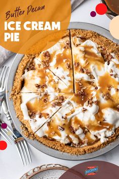 an ice cream pie is shown on a plate with forks and spoons next to it