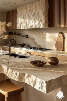 a modern kitchen with stone counter tops and wooden cabinets, along with an island style sink