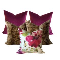 three pillows with different designs on them, one in pink and the other in leopard print