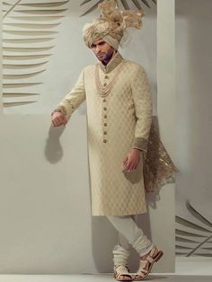 Sherwani features rich quality embellishments accent the on collar and sleeves Comes with off-white kurta and churidar pajama Buy Sherwani Online Beverly Hills California CA USA Sherwani and Kurta Combinations Off White Traditional Wear With Dabka For Designer Occasions, Traditional Off-white Kurta With Naqshi, Traditional Off White Kurta With Naqshi, Fitted Off White Kurta With Naqshi, Festive Off White Traditional Wear With Dabka, Festive Off-white Traditional Wear With Dabka, Off White Long Sleeve Churidar For Designer Wear, Semi-stitched Cream Kurta With Zari Work, Off White Naqshi Sherwani For Diwali