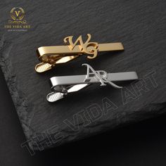 Introducing our Personalized Tie Clip, the perfect accessory for the modern man. Handcrafted with precision, this tie clip is not only a functional piece of attire but also a meaningful keepsake. It is an ideal choice for wedding gifts, anniversary gifts, and a heartfelt present for dad. This tie clip is more than just a piece of men's fashion, it's a of style, sophistication, and sentimentality. This tie clip is meticulously made from high-quality stainless steel that ensures durability and longevity. Its sleek, polished finish adds a touch of elegance to any outfit, whether it's for a business meeting, a wedding, or a casual night out. The personalization aspect allows you to add initials, making it a truly unique and personal item. It's not just a tie clip, it's a story - your story. To Tie Clips For Men, Groomsmen Tie Clip, Gold Tie Clip, Gold Clip-on Cufflinks Gift, Comfy Fall Sweaters, Personalized Tie Clip, Groomsmen Proposal Gifts, Christmas Ties, Personalized Tie