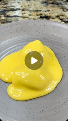 a yellow substance is in the middle of a bowl