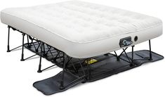 an air mattress is sitting on top of a snowboard with two legs attached to it