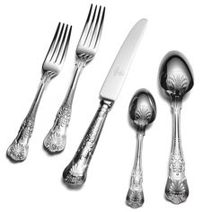 an assortment of silverware including forks, knives and spoons on a white background