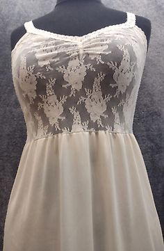 Cream Dress With Sheer Bodice, Stretch White Maxi Dress For Wedding, Sleeveless Beige Dresses For Wedding Night, Beige Sleeveless Dress For Wedding Night, Beige Stretch Lace Dress, Cream Lace Sleeveless Maxi Dress, Cream Lace Maxi Dress For Party, Cream Sleeveless Dress With Lace Bodice, Empire Waist Dress For Wedding Night In Summer