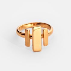 Elevate your daily style with this 24k gold plated ring, featuring a striking geometric design with both high polish and brushed matte finishes. The rectangular shapes add to the overall modern and structured look of the piece. Crafted from recycled brass, it combines sustainability with a sleek but simple art-deco style. Center Accent: 0.19in x 0.59in (5mm x 15mm) Side Accents: 0.11in x 0.39in (3mm x 10mm) Gold Rectangular Modernist Signet Ring, Modernist Gold Rectangular Signet Ring, Modern Gold Signet Ring, Modern Yellow Gold Signet Ring, Bar Ring, Gold Plated Rings, Daily Style, Simple Art, Pop Up Shop