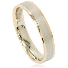 a wedding ring with two tone gold inlays