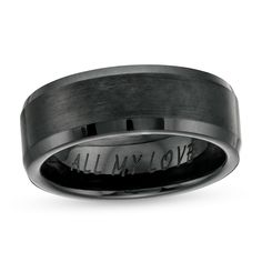 a wedding band with the words all my love engraved on it's center in black stainless steel