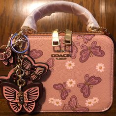 *Nwt-Coach-Set-Lovely Butterflybox Crossbody Bag & Butterflycluster Bag Charm/Keychain-Shell Pink/Boysenberry Multi-$478: *Item #1: Nwt-Coach-Box Crossbody Bag-Lovely Butterflyprint$350: *Product Details: Printed Coated Canvas & Smooth Leather Color: Shell Pink Multi Gold-Tone Hardware Double Zip Closure Top Handle: 1/2" Drop Detachable Strap For Shoulder Or Crossbody Wear: 22-1/2" Drop Fabric Interior Lining 7" L X 5-1/2" H X 2-1/2" W Style: Ch213 Msrp $350 + Tax *Item #2: Nwt-Coach-Butterflycl Pink Coach Bag As Gift, Coach Top Handle Shoulder Bag As Gift, Shell Pink, Coach Shoulder Bag, Charm Keychain, Coach Bag, Pusheen, Butterfly Print, Embossed Leather