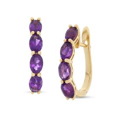 Add color to all your favorite looks with these vibrant gemstone hoop earrings. Fashioned in 14K gold, each striking hoop showcases a quartet of 6.0 x 4.0mm oval-shaped bright purple amethyst lining the front edge. Buffed to a brilliant luster, these earrings secure with hinged backs. 14k Gold Oval Huggie Earrings Fine Jewelry, Classic Yellow Gold Hoop Earrings With Gemstone, Oval Huggie Earrings Fine Jewelry, Vintage Tarot, Gemstone Hoop Earrings, Bright Purple, Purple Stones, Amethyst Earrings, Amethyst Stone