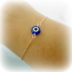 as seen on many this evil eye bracelet I've heard is supposed to bring good luck.... details: Rose Gold Filled glass evil eye measures 8mm Dainty Chain measures 1mm please select your desired length from top right drop down menu thanks for looking :0) Blue Hypoallergenic Evil Eye Bracelet As Gift, Hypoallergenic Blue Evil Eye Bracelet Gift, Blue Round Evil Eye Bracelets, Blue Evil Eye Round Bracelets, Dainty Blue Round Evil Eye Bracelet, Hypoallergenic Evil Eye Bracelet Gift, Adjustable Rose Gold Evil Eye Bracelet, Rose Gold Evil Eye Bracelet As Gift, Blue Evil Eye Bracelet Gift