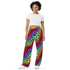 ✨ Elevate your loungewear game with our All-Over Print Unisex Wide-Leg Pants. These pants offer the ultimate combination of style and comfort, making them perfect for both lounging at home and stepping out in style. With a relaxed unisex fit, practical side pockets, and an elastic waistband with a white drawstring, these pants provide an effortlessly chic look. ✨ Crafted from premium knit mid-weight jersey fabric, these pants are made from 95% polyester and 5% elastane, ensuring a stretchy and comfortable fit that feels like your favorite sweatpants but better. The adjustable waist allows you to wear them on your hips or waist, providing versatility and comfort for any occasion. ✨ Our pants are made-to-order, ensuring each pair is crafted with care and helps reduce overproduction. Thank yo Multicolor High-waisted Lounge Pants, Relaxed Fit Multicolor Wide-leg Pants, Multicolor Stretch Full-length Pants, Multicolor Wide-leg Loungewear Bottoms, Multicolor Graphic Print Wide-leg Bottoms, Pantalon Large, Mens Trousers, Look Chic, Jersey Fabric