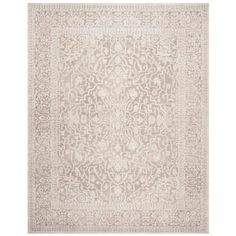 a beige rug with an intricate design on the top and bottom, along with a white background