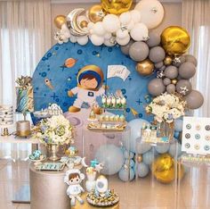 a baby shower party with balloons and decorations