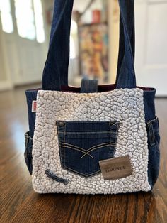 a handbag made out of old jeans