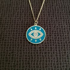 Brand New With Tags Stella Rose Evil Eye Pendant Necklace Excellent Condition With No Flaws 18k Gold Plating Over 925 Sterling Silver Chain Length Approx 16" With 2" Extender Pendant Diameter Approx 3/4" Gold Disc With Turquoise Colored Enamel And A Gold Evil Eye With Pave Crystals And Gold Rays Emanating From The Eye (Or Some May Say Gold Eyelashes) Spring Ring Closure Please No Trades Or Lowballs! *Ask Any Questions You May Have Prior To Making An Offer Or Purchase Please* Blue Tarnish Resistant Pendant Jewelry, Blue Tarnish-resistant Pendant Jewelry, Blue Charm Necklaces With Adjustable Chain, Blue Charm Necklace For Gift, Blue Round Charm Necklace Gift, Blue Sterling Silver Charm Necklace With Adjustable Chain, Blue Round Pendant Jewelry, Tarnish Resistant, Blue Clavicle Chain Charm Necklace, Blue Evil Eye Charm Necklace