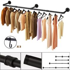 an image of clothes hanging on a rack with umbrellas and other things to use