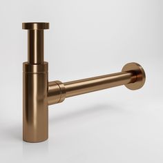 a modern bathroom faucet with gold colored metal finish and round spouting