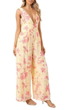 A dreamy floral print covers this lightweight jumpsuit designed with flowy wide legs and a flirty plunging neckline. Hidden side-zip closure; ties at back Plunge neck Sleeveless Side-seam pockets Lined 70% viscose, 30% nylon Hand wash, dry flat Imported Chic Flowy Jumpsuits And Rompers With Floral Print, Chic Flowy Floral Jumpsuits And Rompers, Flowy V-neck Jumpsuits And Rompers For Vacation, Wide Leg Jumpsuits And Rompers For Spring Beach, Wide-leg Jumpsuits And Rompers For Spring Beach, Wide Leg Jumpsuits For Beach In Spring, Flowy V-neck Jumpsuit For Vacation, Chic Flowy Jumpsuits And Rompers For Vacation, Spring Beach Flowy Jumpsuits And Rompers