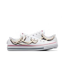 Embrace elegance and comfort with our exclusive "Chucks & Pearls" Limited Edition Converse sneakers. Featuring beautiful pearl artwork, these shoes are a tribute to elegance and strength, seamlessly blending classic Converse comfort with sophisticated design. Each pair boasts 4 pearl necklaces on the left shoe and 7 on the right, adding a unique flair to any outfit, from casual wear to chic ensembles. Inspired by icons of style and empowerment, our Chucks & Pearls edition is a must-have for thos Elegant Low-top Custom Sneakers, Luxury White Custom Sneakers With Rhinestones, Luxury White Sneakers With Rhinestones, Elegant Sneakers With Rhinestones, Elegant Rhinestone Sneakers With Round Toe, Elegant Round Toe Sneakers With Rhinestones, Elegant Slip-on Sneakers, Elegant Party Sneakers With Rhinestones, Elegant White Low-top Sneakers