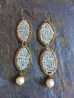 A personal favorite from my Etsy shop https://www.etsy.com/listing/279269304/freshwater-pearl-gold-hoop-statement Elegant Handmade Hoop Beaded Earrings, Gold Beaded Teardrop Pearl Earrings, Handmade White Pearl Hoop Earrings, Handmade Pearl White Drop Earrings, Handmade Pearl White Dangle Pearl Earrings, Handmade Pearl White Drop Pearl Earrings, Elegant Handmade Oval Beaded Earrings, Handmade Pearl Hoop Earrings, Handmade Oval Pearl Jewelry