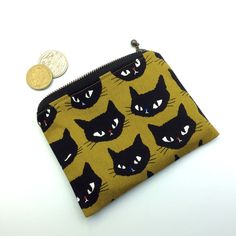 "This is a seconds sale item  Please note, this item is \"seconds\" and has been discounted due to a defect in the fabric. Please refer to the last 2 photos for close up of defect. ----------------------------------------------------------------------------------------------- This is a small cats print fully lined coin purse.  This cats zipper bag is made of cotton fabric.  We imported the cat fabric and the YKK zip then cut and sewed with care and love.  This can be used to carry your belonging Coin Pouch Aesthetic, Cute Small Wallets, Jocelyn Core, Creative Iphone Case, Black Cat Print, Cat Fabric, Stuff And Thangs, Unicorn Print