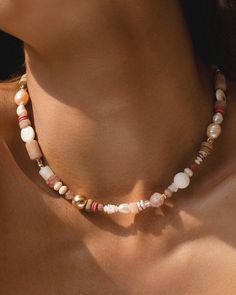 The Gigi is uniquely crafted to capture the essence of natural beauty and individuality. Each gemstone is hand-selected for its vibrant color and unique patterns. From the calming tones of moonstone to the rich hues of rhodonite, every stone tells its own story, making each necklace a one-of-a-kind treasure. Final sale 14k gold-filled accents and finishes Mixed natural gemstones Moonstone Freshwater pearl Sandstone Quartz Shell Rhodonite Natural silk cording 18" Nickel- and lead-free Rose Quartz Gemstone Necklaces With Round Beads, White Rose Quartz Necklaces With Natural Stones, White Rose Quartz Necklace With Natural Stones, Pink Opal Beaded Necklace For Gift, Bohemian Rhodonite Jewelry With Natural Stones, Pink Opal Round Beads Necklace For Gift, Gift Pink Opal Beaded Necklace With Natural Stones, Pink Opal Gemstone Beads For Jewelry Making, Rose Quartz Beaded Necklaces With Natural Stones Gift