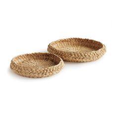 two woven baskets sitting on top of each other