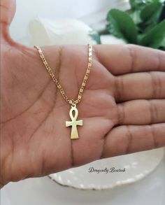 Gold Crucifix Necklace. Ankh Necklace. Minimalist Chain is a 2mm Scroll Chain, Crucifix is 20mm in height, including the bail & 10mm width. Made of 14k Gold Over Base Metal, High Quality Necklace ALWAYS BEST PRICES No need to wait on any sale to get these amazing low prices! Please compare my prices and see for yourself! If you have any questions, please feel free to contact me, I responded quickly! 😉 Spiritual Cross Chain Necklace Gift, Nickel-free Ankh Necklace As Gift, Nickel Free Ankh Jewelry Gift, Gift Cross Chain Necklace With Delicate Chain, Nickel-free Ankh Jewelry Gift, Gift Cross Necklace With Delicate Chain, Delicate Cross Chain Necklace Gift, Delicate Chain Cross Necklace For Gift, Minimalist Cross Chain Necklace As Gift