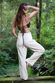 Our Hand-Made Natural Cotton Harem Pants are made with soft and breathable 100% hand-woven khadi cotton, these trousers are super comfortable making them perfect for yoga, festivals, and day-to-day earth dwelling. Unisex, featuring two pockets and a string tie for a personalized fitting. Measurements:S/Mwaist: 88cmLeg length: 106 cmHip to groin: 32 cmM/Lwaist: 90 cmLeg length: 108 cmHip to groin: 34cm L/XLwaist: 92 cmLeg length: 109 cmHip to groin: 35 cm Hand made with Love ❀ Cotton Relaxed Fit Tapered Yoga Pants, Relaxed Fit Cotton Yoga Pants Tapered Leg, Relaxed Fit Conscious Cotton Bottoms, Hippie Style Straight Leg Pants For Festival, Relaxed Fit Cotton Straight Leg Yoga Pants, Hippie Straight Leg Festival Pants, Relaxed Fit Straight Leg Cotton Yoga Pants, Hippie Straight Leg Pants For Festival, Cotton Tapered Leg Yoga Pants