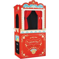 an old fashioned red theater booth with curtains on the front and back sides, for children to play in