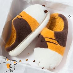 Introducing Cat Paw Slippers! Super soft slippers perfect for the holidays, or a gift for someone you love! Insole Material: Short Plush Upper & Lining Material: Polyester Outsole Material: PVC Fit: True to size Cute Brown Round Toe Slippers, Yellow Slip-on Winter Slippers, Winter Yellow Round Toe Slippers, Yellow Slip-on Slippers For Winter, Yellow Round Toe Indoor Slippers, Bear Claw Slippers, Claw Slippers, Paw Slippers, Ipad Pouch