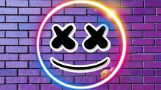 a smiley face with two crossed eyes on a purple brick wall in front of a neon circle