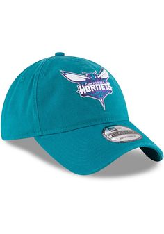 This Charlotte Hornets Teal Adjustable Hat features a front embroidered team logo on a lightly-structured cotton crown, with pre-curved visor and adjustable backstrap. Team logo embroidered on the front, Cloth Strap Closure to dial in the perfect fit, Relaxed, unstructured fit, Pre-curved bill, 100% cotton construction, New Era Flag logo on side, Dad hat, 100% Cotton, Washable, Imported Curved Brim Hats With Team Logo For Fans, Cotton Hat With Team Logo For Sports Events, Sporty Cotton Hats For Fan Merchandise, Curved Visor Cotton Hat For Fan Gear, Cotton Curved Visor Hat For Fan Gear, Sports Fan Hat In Cotton For Fan Merchandise, Cotton Cap For Fan Merchandise, Curved Bill Cotton Hat For Fan Merchandise, Cotton Curved Bill Hat For Fan Merchandise