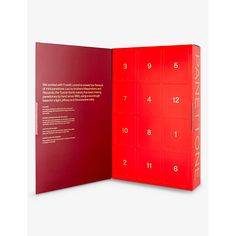 an open red book with numbers on the front and back cover, in white background