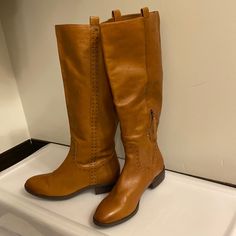 Sam Edelman New Never Worn Leather Pull-On Tab And Side Zipper Closure Casual Leather Knee-high Boots, Casual Leather Riding Boots, Casual Wide Calf Leather Moto Boots, Casual Riding Boots With Leather Footbed, Casual Wide Calf Boots With Almond Toe, Casual Wide Calf Boots For Riding, Casual Leather Knee-high Boots With Almond Toe, Fall Walking Boots With Almond Toe, Casual Riding Boots For Fall