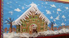 a gingerbread house is decorated with icing and decorations