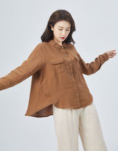 "Introducing our stunning brown linen long-sleeve shirt, crafted from high-quality, breathable linen fabric. The versatile brown color is a timeless classic, pairing well with any outfit. The relaxed fit makes it comfortable and easy to wear, whether dressed up or down. Perfect for any season, this shirt is sure to become a staple in your wardrobe. Details: * 100% linen  * Casual Linen shirt, Plus size Linen shirt * long sleeves Linen shirt * Plus size Linen top * Oversize Linen blouse * Fashionable shirt, Durable and Breathable fabric  * Perfect for Spring, Summer * Dry clean Mode size Bust 33\"(85cm) Waist 26\"(66cm) Heigth 5'7\"(167cm) She wears the size XS Choose CUSTOM Order if you * Can't find your size in our size Chart * Your Height is not Between 5'1\" - 5\"9\" * Your weight is ov Casual Long Sleeve Flax Blouse, Brown Relaxed Fit Blouse For Fall, Brown Solid Color Tops For Work, Relaxed Fit Long Sleeve Blouse In Flax Color, Collared Linen Blouse For Fall, Flax Long Sleeve Relaxed Fit Blouse, Flax Colored Long Sleeve Relaxed Fit Blouse, Relaxed Fit Long Sleeve Flax Blouse, Casual Plain Long Sleeve Blouse