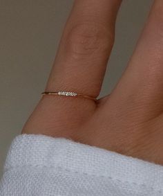 The perfect pinky ring. Dainty yet durable, this piece is stunning. Beautiful by itself, even better in a stack. Solid 14k gold. 5 Natural bright white diamonds. Custom made to order, final sale. Please allow 4-7 business days for production. Also available in 14k rose gold, email info@belladaar.com to order. Women’s Pinky Rings, Tiny Diamond Jewelry, Dainty Pinky Ring, Diamond Pinky Ring For Women, Gold Pinky Ring Women, Pinkie Rings For Women, Pinky Promise Rings, Gold Ring Ideas, Gold Pinky Rings