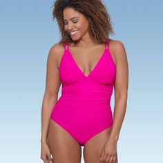 Enjoy all your sunny days with ease in this one-piece bathing suit by Aqua Green! Designed for both fun and comfort, it features shirring for a flattering midsection, removable cups for customizable support, and adjustable straps for the perfect fit. With full bottom coverage, you can enjoy every moment without worry. Elevate your style and embrace confidence in every splash! Pink Swimwear With Upf 50+ Stretch, Pink Stretch Swimwear With Upf 50+, Turquoise One-piece Summer Swimwear, Pink Nylon One-piece Swimwear, Pink V-neck One-piece Beachwear, Cheeky One Piece Swimsuit, Green One Piece, Green Swimwear, Plunging One Piece Swimsuit