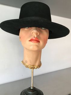 "Hard structure black felt hat. Seems to be an early hat, maybe as early as the 1930's. In good vintage condition. Measurements are: Circumference21\" Dome4\" Brim3\" Feel free to convo me with any further questions. Thank you for your interest." Vintage Black Wide Brim Costume Hat, Vintage Black Costume Hat With Curved Brim, Vintage Black Adjustable Fedora, Black Adjustable Vintage Fedora, Vintage High Crown Fedora With Adjustable Fit, Vintage Black Cloche Hat With Wide Brim, Black Vintage Cloche Hat With Wide Brim, Vintage Fedora With High Crown, Vintage High Crown Fedora