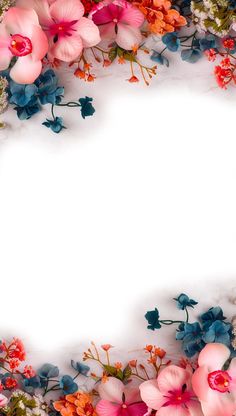 an overhead view of colorful flowers on a white background