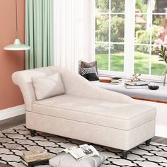 a white chaise lounge chair sitting on top of a rug in front of a window