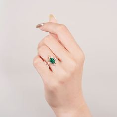 This dazzling and beautifully emerald ring is hand-crafted here at Kherish to the highest standard. This stunning ring will be great to dress up your outfit and make you stand out. ✦ DETAILS ✦ ✧ Handcrafted ✧ Emerald and crystals ✧ Sizes 3.5-11.5 ✧ This ring set will arrive ready to gift in a Kherish box. ✧ Due to the nature of the crystals, each piece may vary in color, size, shape, and contain natural inclusions. Every piece is gorgeous and one of a kind. Elegant Flower Ring As Promise Ring With May Birthstone, Elegant May Birthstone Flower Ring With Gemstone, Green Gemstone Flower Ring, Elegant Green Sterling Silver Flower Ring, Elegant Green Flower Ring In Sterling Silver, Fine Jewelry Flower Ring With May Birthstone, Dazzling Emerald Promise Ring, Dazzling Green Emerald Ring Gift, Green Cubic Zirconia Ring For Proposal