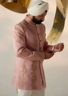 Showcasing our new long bandhgala silhouette in rose pink color. Hand embroidered with rose pink zari and gold button detailing. Paired with ivory tapered trousers. Jatin Malik, Blouse Yoke, Rose Pink Color, Pink Wedding Dress, Haldi Ceremony, Royal Look, Tapered Trousers, Indian Wedding Outfits, Pink Linen